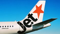 Jetstar loses $116m despite strong domestic