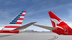 Qantas cuts points, status credits on AA