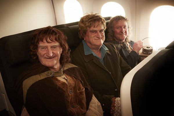 Somebody better tell that hobbit next to the window that this is a non-smoking flight