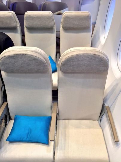 18 inches wide but the armrests are oh-so-narrow. John Walton