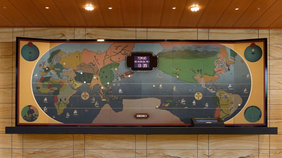 The Seiko world map and clock display in the lobby of the Prestige Tower.