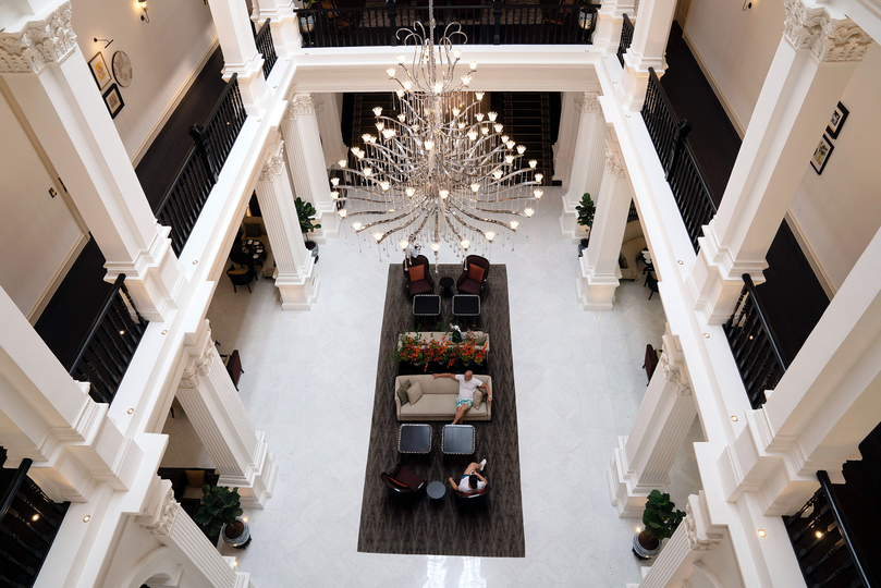 In the Grand Lobby, the eyes are drawn upward to a single glittering chandelier, made in Prague and boasting 8,142 crystals.