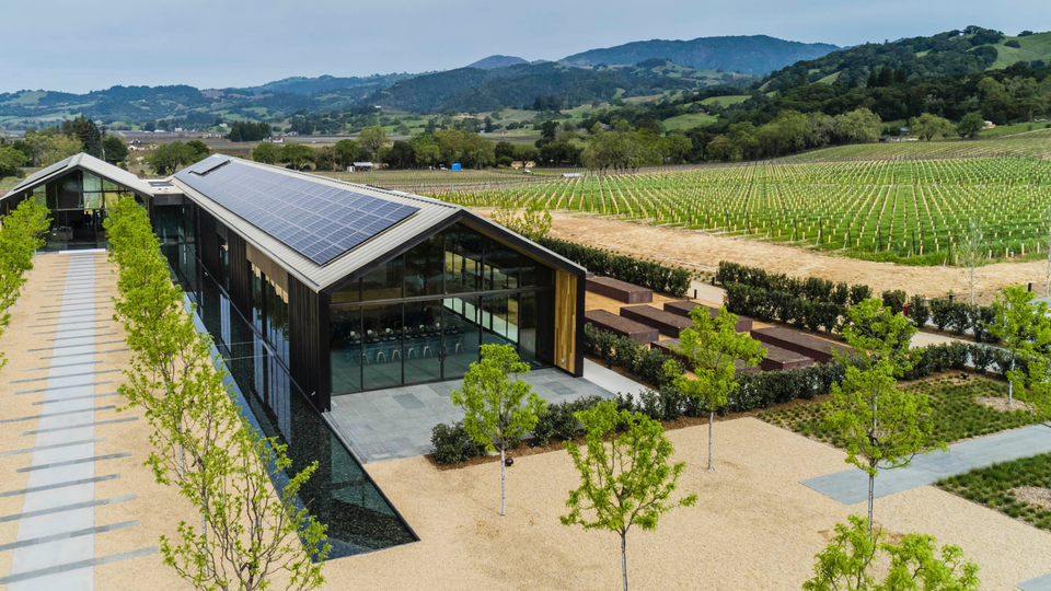 Solar panels and salvaged redwood help Silver Oak Alexander Valley add more green to the vineyard grapescape.