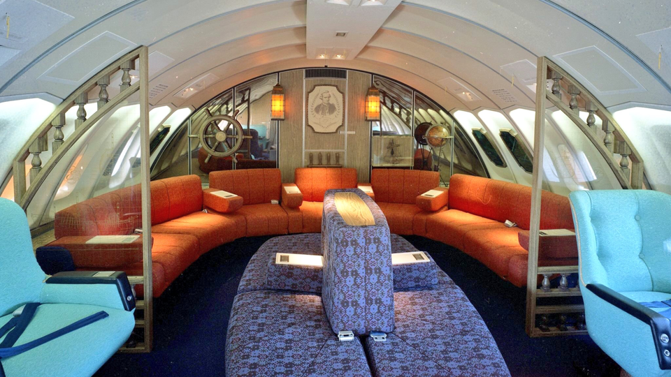 The upper deck of the first Qantas Boeing 747s were fitted out with the colourful Captain Cook lounge.