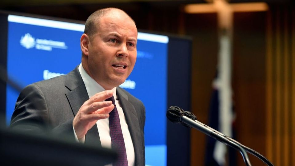 Federal Treasurer Josh Frydenberg: don't be in a hurry to dust off your passport.