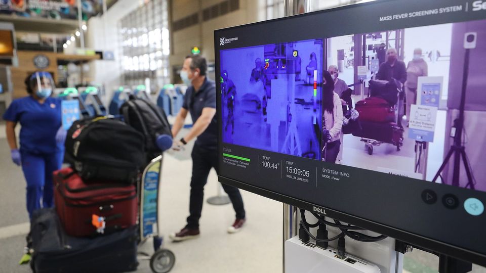 Thermal imaging cameras are checking body temperatures at Los Angeles International Airport amid the Covid-19 pandemic.