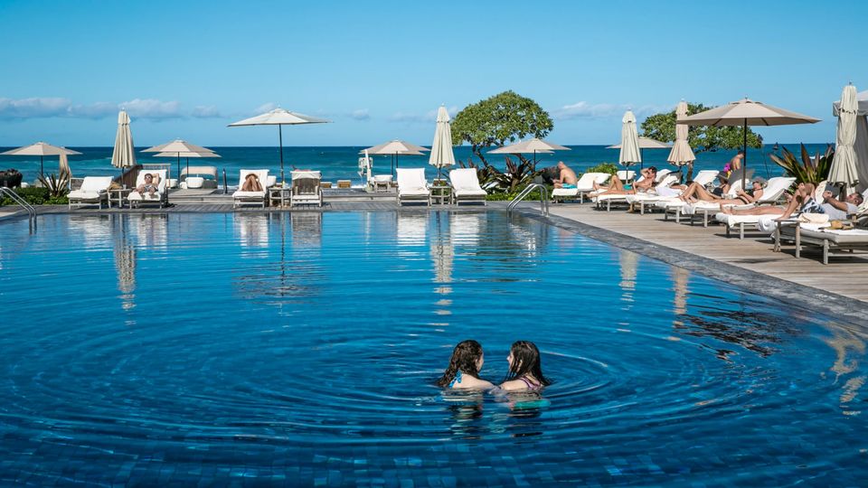 A beach swimming pool at the Four Seasons Hotel Hualalai, along the Kona Kohala Coast, Hawaii.