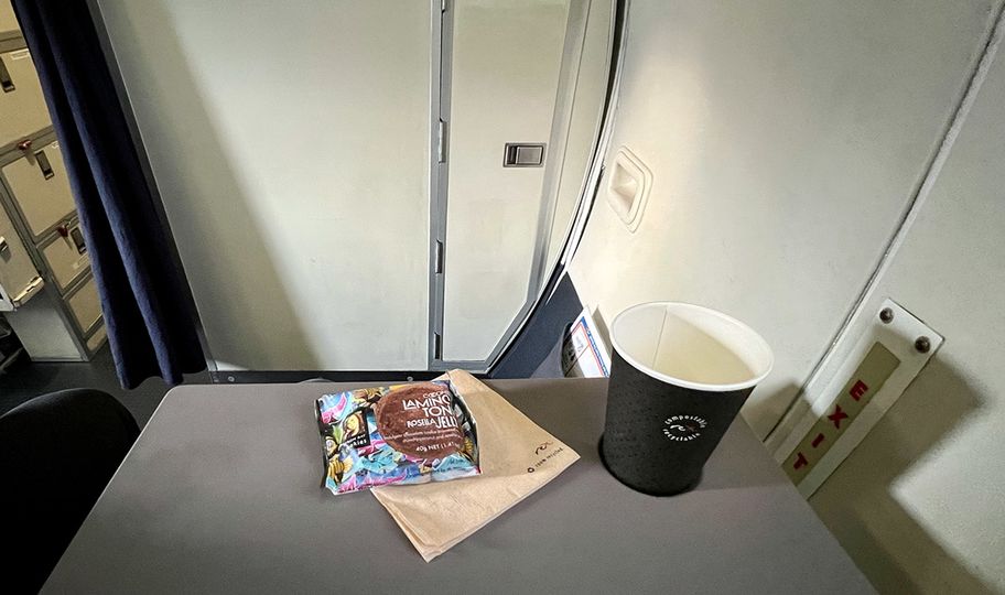 Passengers receive a complimentary drink and snack
