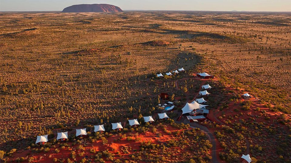 A bird's eye view of Longitude 131°, with sacred Uluru beyond.