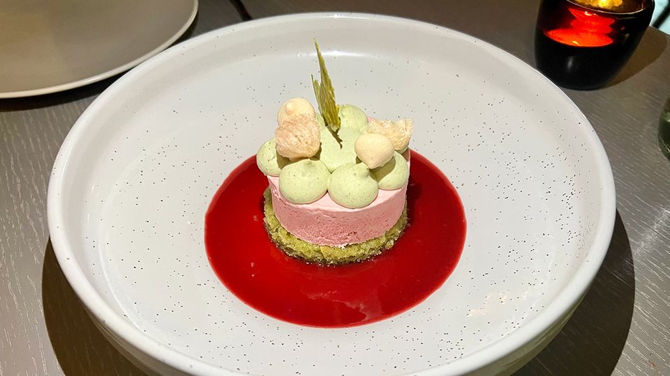 Raspberry lychee and rose semifreddo, with pistacchios and aqua faba meringue.