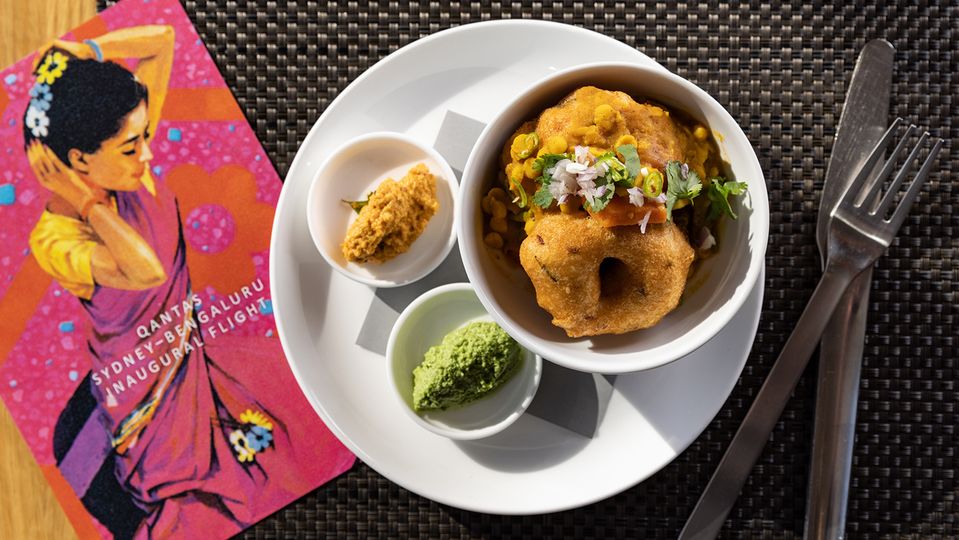 Paneer makhani with cumin seed pilaf, green peas and beans masala, served in economy.