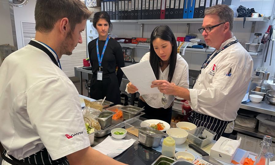 Alex Woolley and Jamie Cho working together to fine-tune the lounge's new Korean dishes.