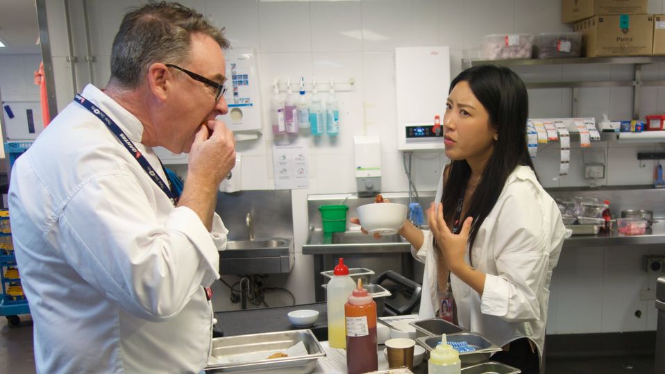 Alex Woolley and Jamie Cho compare notes on the Korean-style friend chicken wings.