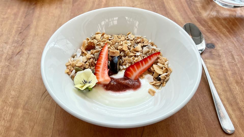 Breakfast begins with maple granola.