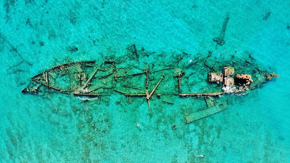 The Hinko Maru shipwreck is a popular snorkelling destination.. JNTO