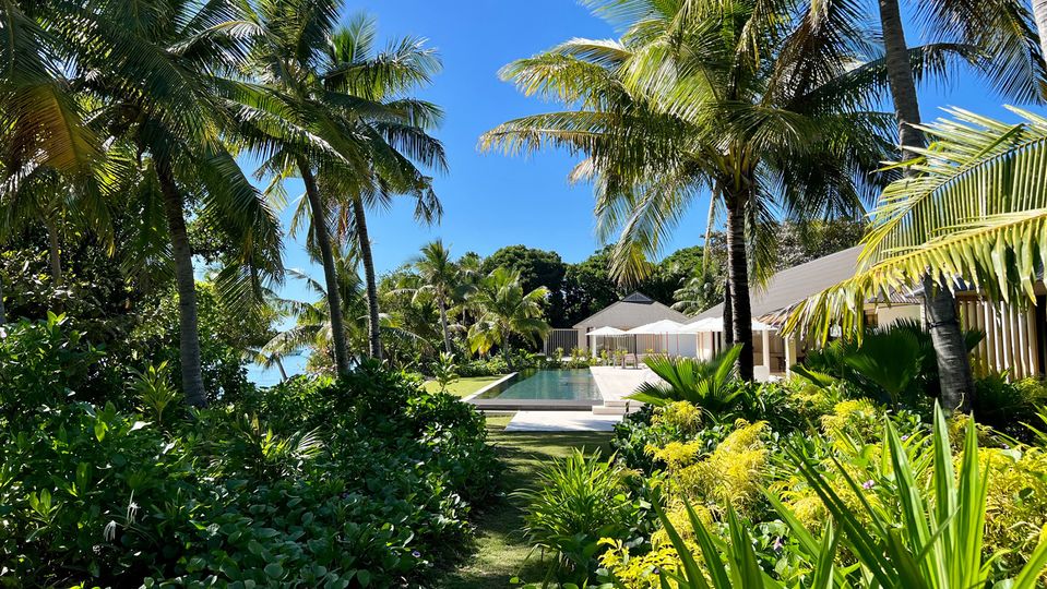 Lush gardens anchor the property into its surroundings.