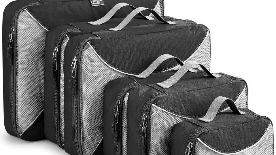 Start with a set of packing cubes in various sizes.