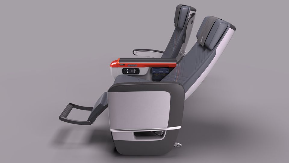 Seats at the bulkhead have an integrated foot and leg rest, while others have a foot rest beneath the seat in front.