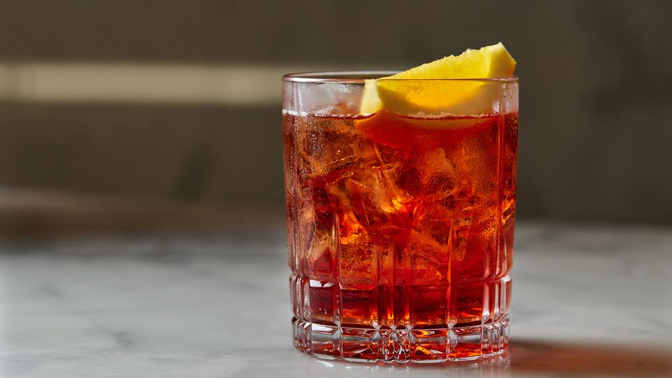Kick off your meal with the bitter zestiness of Campari.
