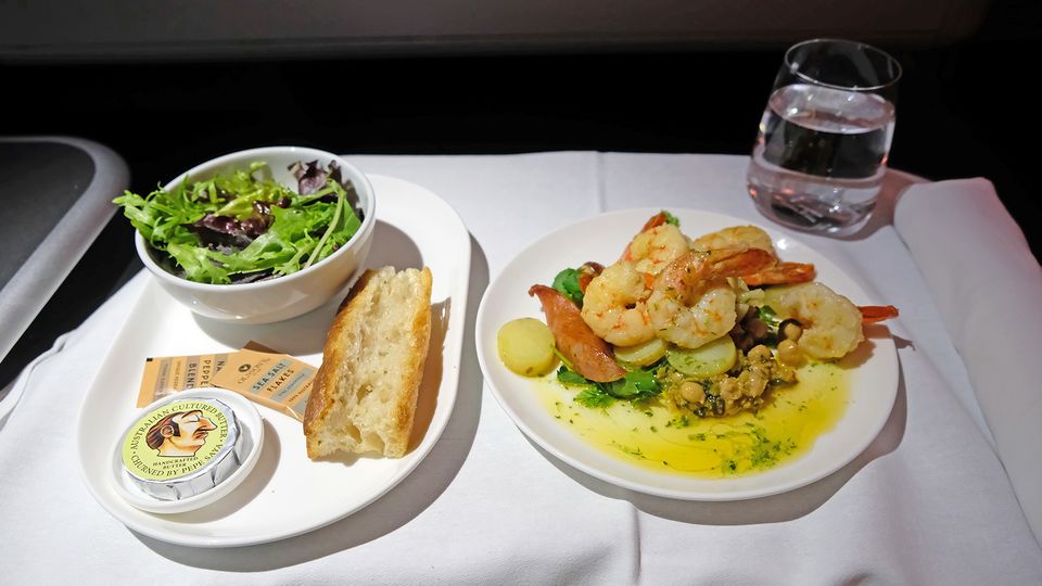 Tiger prawns with ciabatta bread and green salad by Neil Perry.