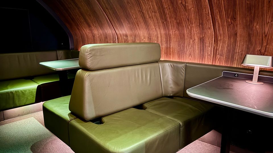 Passengers can relax at one of the seating tables.