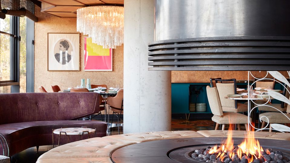 Warm up by the fireplace at Ovolo Nishi.