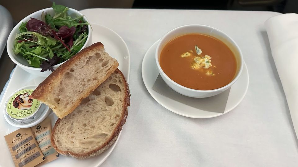 Pumpkin and ginger soup with chive creme fraiche.