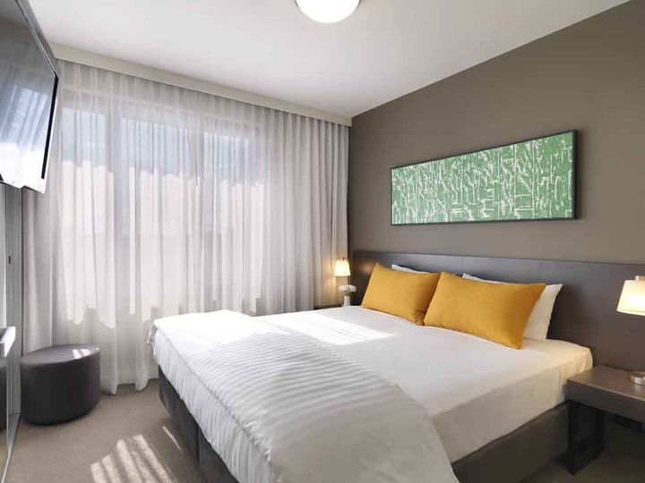 An apartment bedroom at the Adina Apartment Hotel Sydney Airport