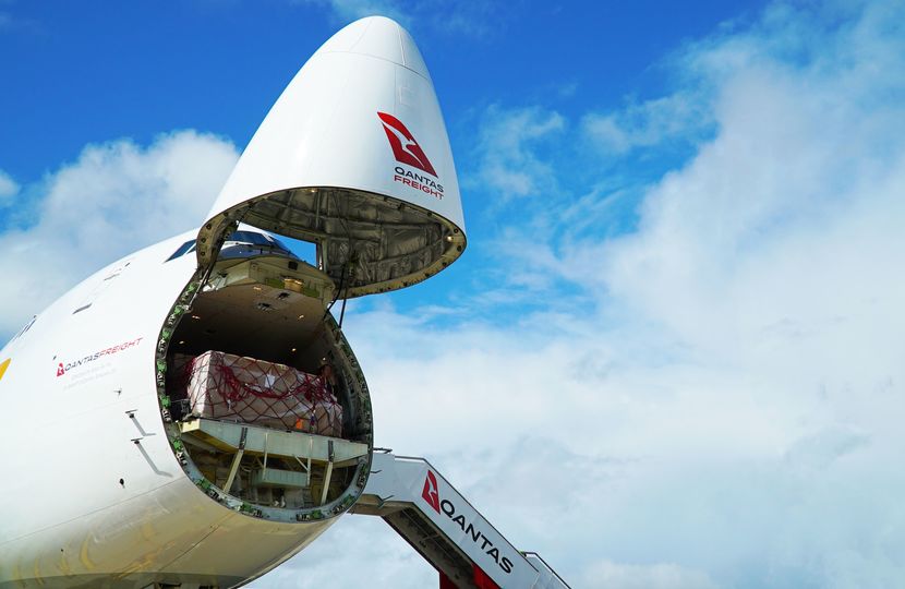 The Atlas Air / Qantas Freight Boeing 747-8 loads cargo by opening its nose.